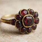 Garnet and sustainable engagement rings with vintage and petite styles