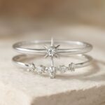 A stunning purple diamond engagement ring alongside a star engagement ring.