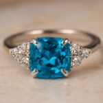 A collection of blue engagement rings and blue zircon engagement rings
