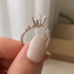 A collection of cluster engagement rings including snowflake and trillion designs